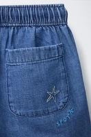 EMBROIDERED PALM TREE DENIM SHORTS