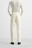 ADJUSTABLE RELAXED FIT JEANS