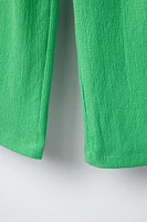 TEXTURED BELTED PANTS