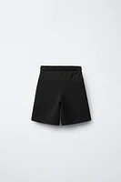 BERMUDA SPORT EN MATIÈRES VARIÉES