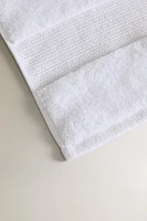 METALLIC THREAD BATH TOWEL WITH BORDER