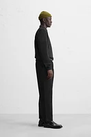 INTERLOCK POLO QUARTER-ZIP SWEATSHIRT