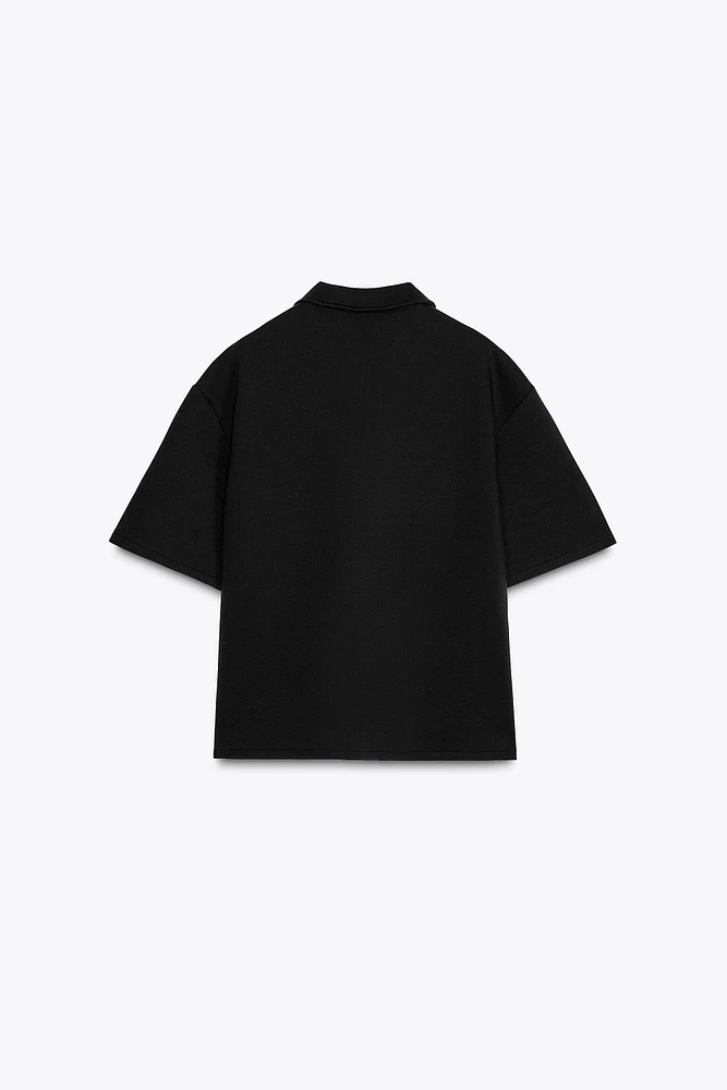 ZIP POLO COLLAR TOP