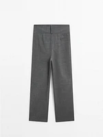 Straight trousers with wide waistband