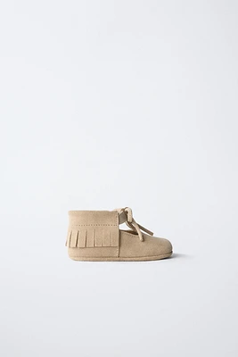 LEATHER FRINGED BALLET FLATS
