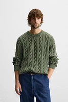 WASHED CABLE-KNIT SWEATER