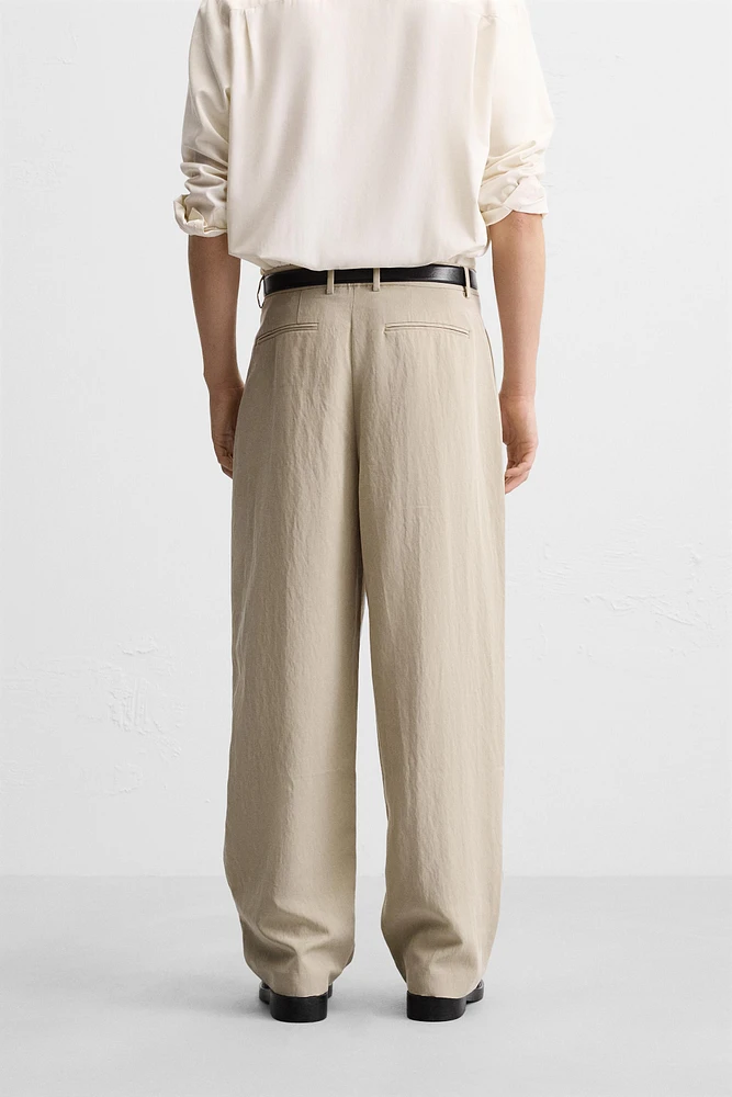 PLEATED WIDE FIT PANTS