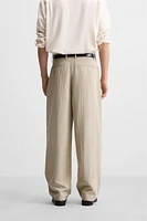 PLEATED WIDE FIT PANTS