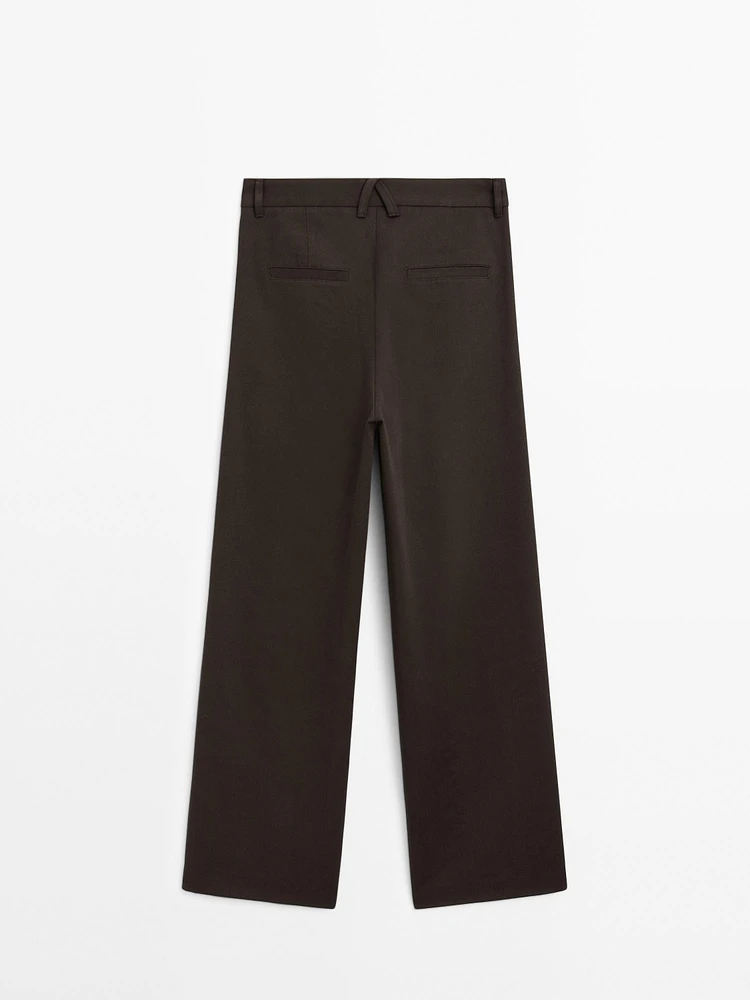 Wide-leg pleated cotton blend trousers