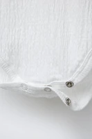 TEXTURED BODYSUIT