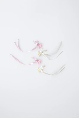 PACK OF FOUR BOW HAIR CLIPS