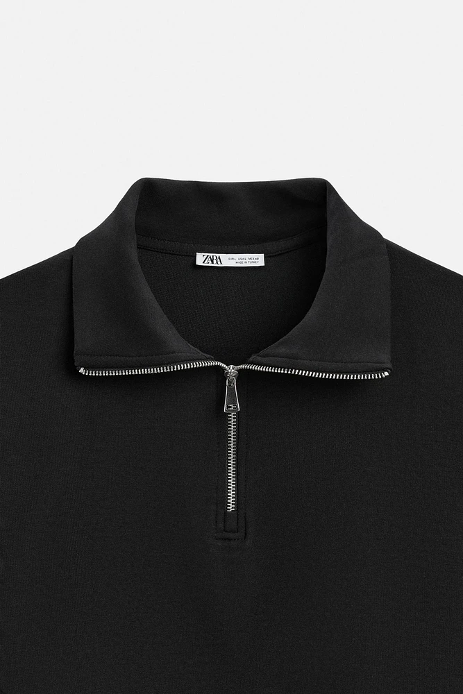 TECHNICAL QUARTER-ZIP SWEATSHIRT