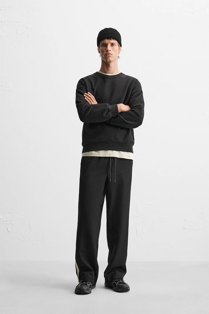 TECHNICAL PANTS WITH BANDS