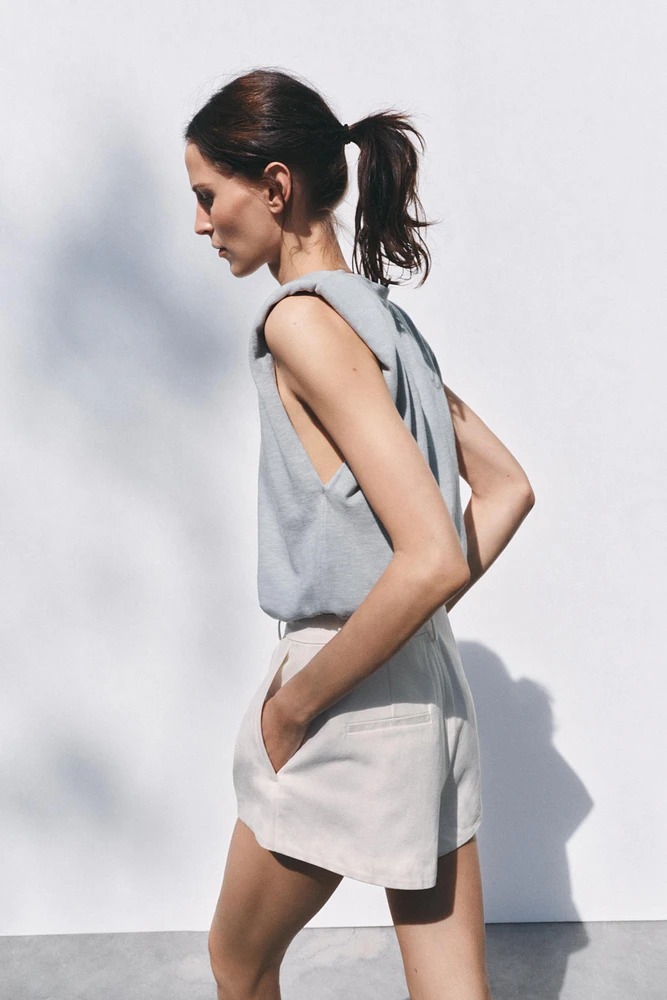 WASHED EFFECT T-SHIRT WITH SHOULDER PADS