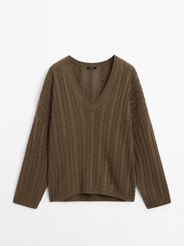 Cable-knit V-neck sweater