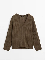 Cable-knit V-neck sweater