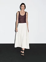 Jupe midi ample avec coutures marquées