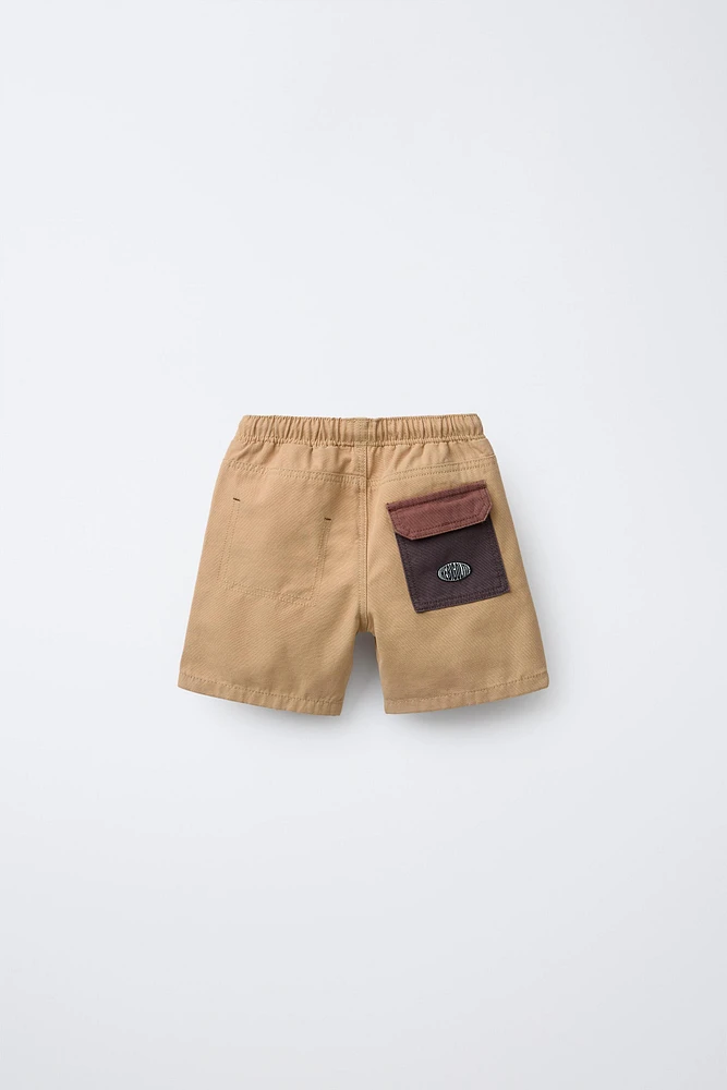 CONTRASTING POCKET TWILL SHORTS