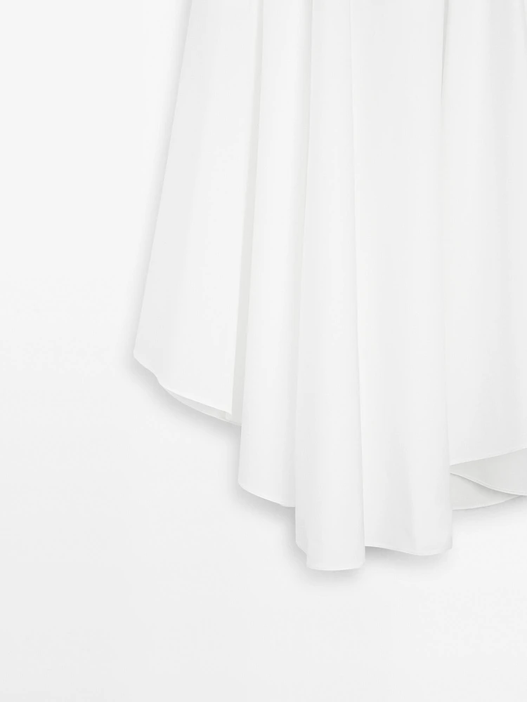 Flowing asymmetric midi skirt
