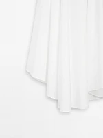 Flowing asymmetric midi skirt