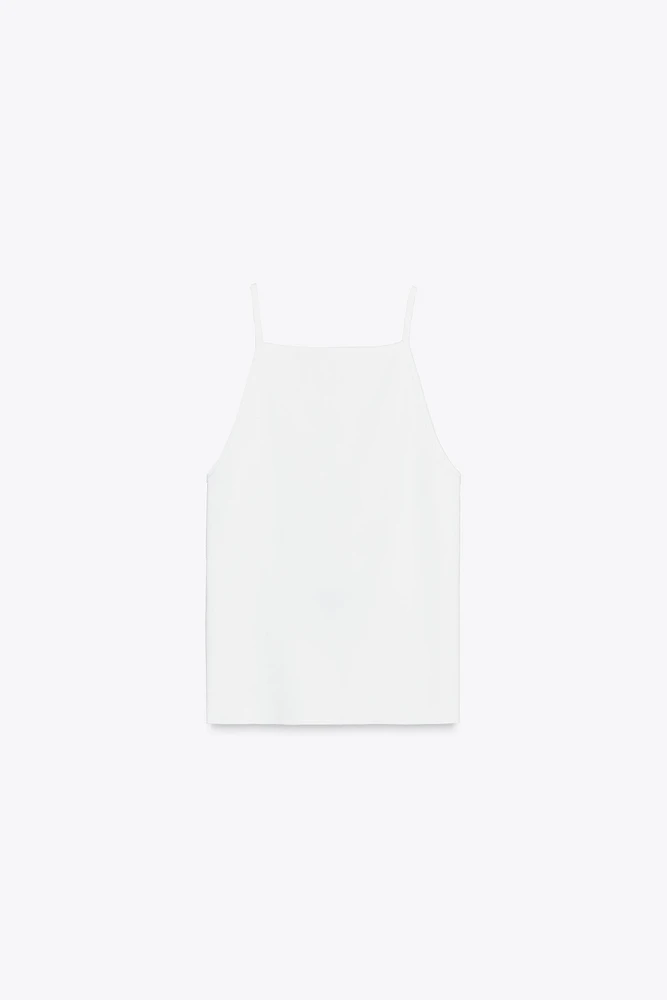 TOP EN MAILLE AJOURÉ AVEC LACETS