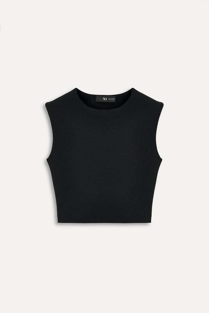 BUCKLED CROP TOP 50TH ANNIVERSARY
