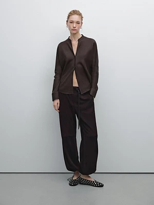Flowing linen shirt with stand collar