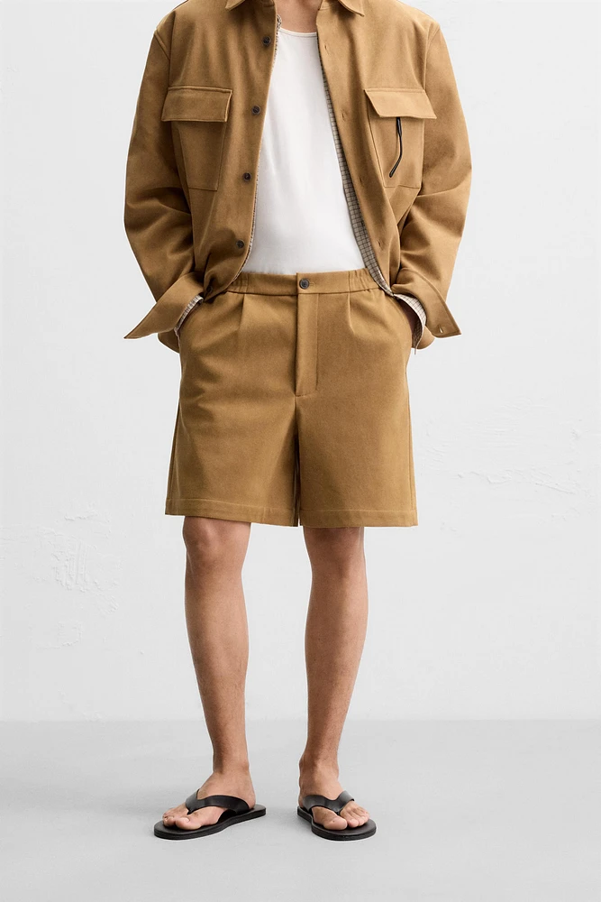 PLEATED FAUX SUEDE SHORTS