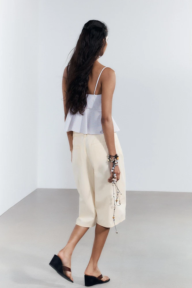 VOLUMINOUS STRIPED POPLIN TOP