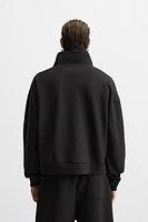 TECHNICAL QUARTER-ZIP SWEATSHIRT