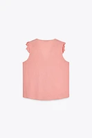 RUFFLED SLEEVELESS TOP