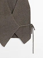 Veste sans manches cache-cœur en maille moulinée