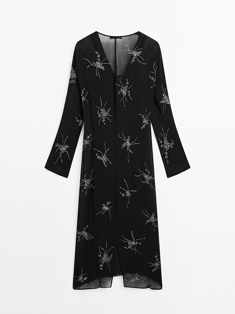 Robe midi fluide avec broderies