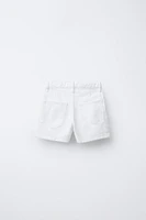 EYELET SKORT SHORTS