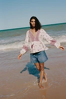 BLOUSE IMPRIMÉE À POMPONS