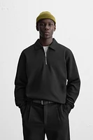 INTERLOCK POLO QUARTER-ZIP SWEATSHIRT