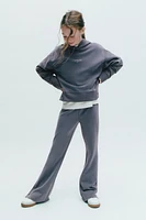 BUTTONED FLARED LEGGINGS
