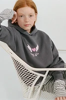 SWEAT À CAPUCHE IMPRIMÉ