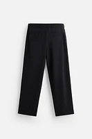 FLOWY PLEATED PANTS