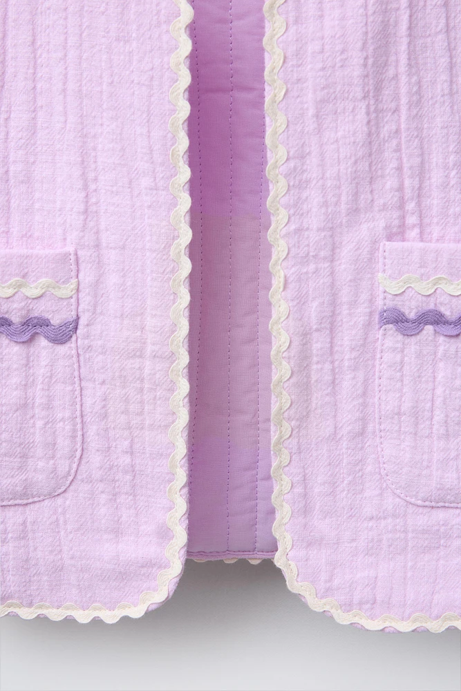 GILET TEXTURÉ ONDULINE