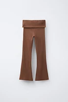 FOLD-OVER WAISTBAND FLARE LEGGINGS WITH EYELETS