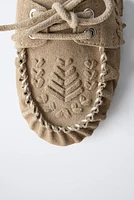 FRINGED LEATHER LOAFERS