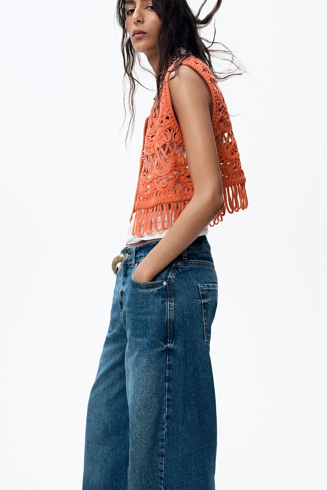 GILET EN MAILLE À FRANGES