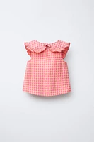 BLOUSE À CARREAUX ET BRODERIES