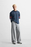 T-SHIRT STRUCTURE OUVERTE VARSITY