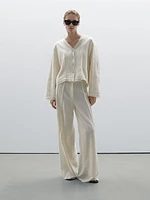 Cotton blend trousers with embroidered details