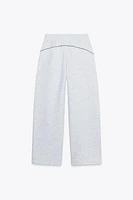 PANTALON TEXTE LISERÉS