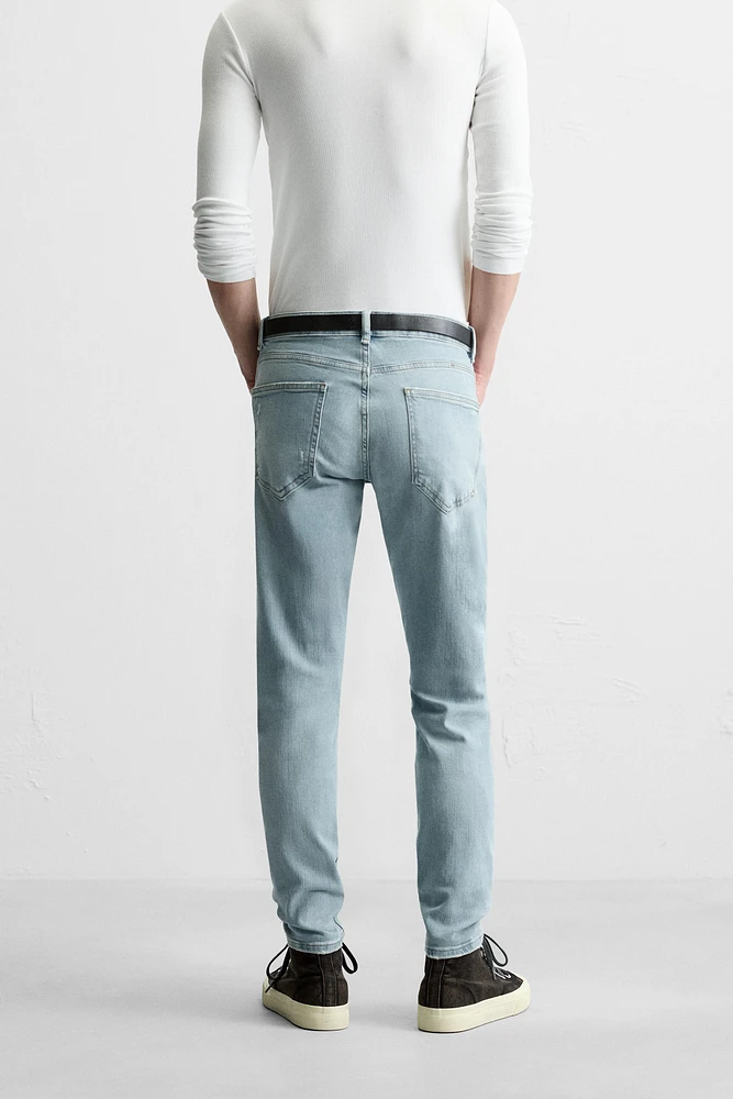 RIPPED SKINNY JEANS