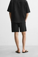 CHECKERED TEXTURED SHORTS