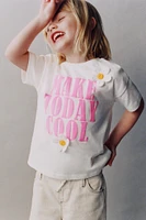 T-SHIRT À INSCRIPTION ET DÉCOR FLEURS